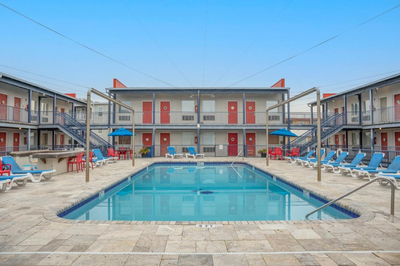 Outdoor swimming pool at Sea and Breeze Hotel and Condo